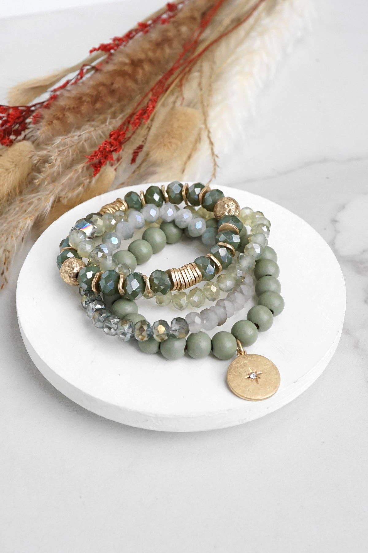 Beaded bracelets stack in Olive green with a coin charm