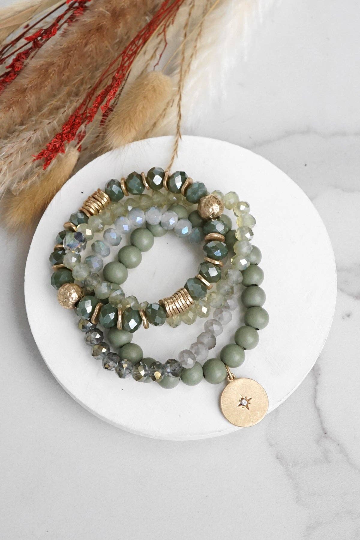 Beaded bracelets stack in Olive green with a coin charm